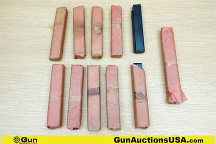 Seymour Thompson .45 cal Mags. Very Good. 11 Mags Contained in Original Wrappers. Includes 9 Wrapped