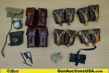 Military Surplus Ammo Pouches, Etc. . Good Condition. 6 Ammo Pouches with Cleaning Kits. . (73800)