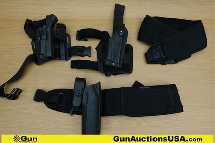 Safari Land, Pro Tech, Etc. Holsters, Etc. . Good Condition. 2- Kydex Drop Leg Holsters. 1-