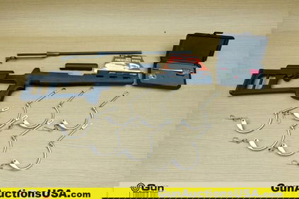 Advanced Technology, Etc. Gun Parts . Good Condition. One SKS Stock, One Garand Charging Handle and