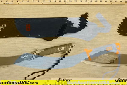 Gerber Bear Grylls Machete. Very Good. 13.5" Blade, 19.5" Overall. Single Edge Steel Blade, Rubber