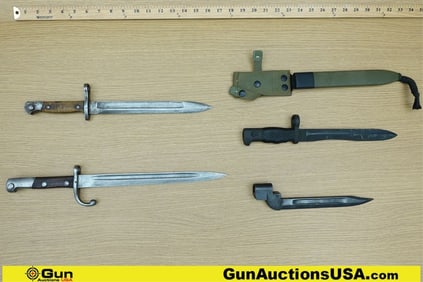 Military Surplus Bayonets. Good Condition. 4 Assorted Bayonets; 1 of the Bayonets Includes Sheath