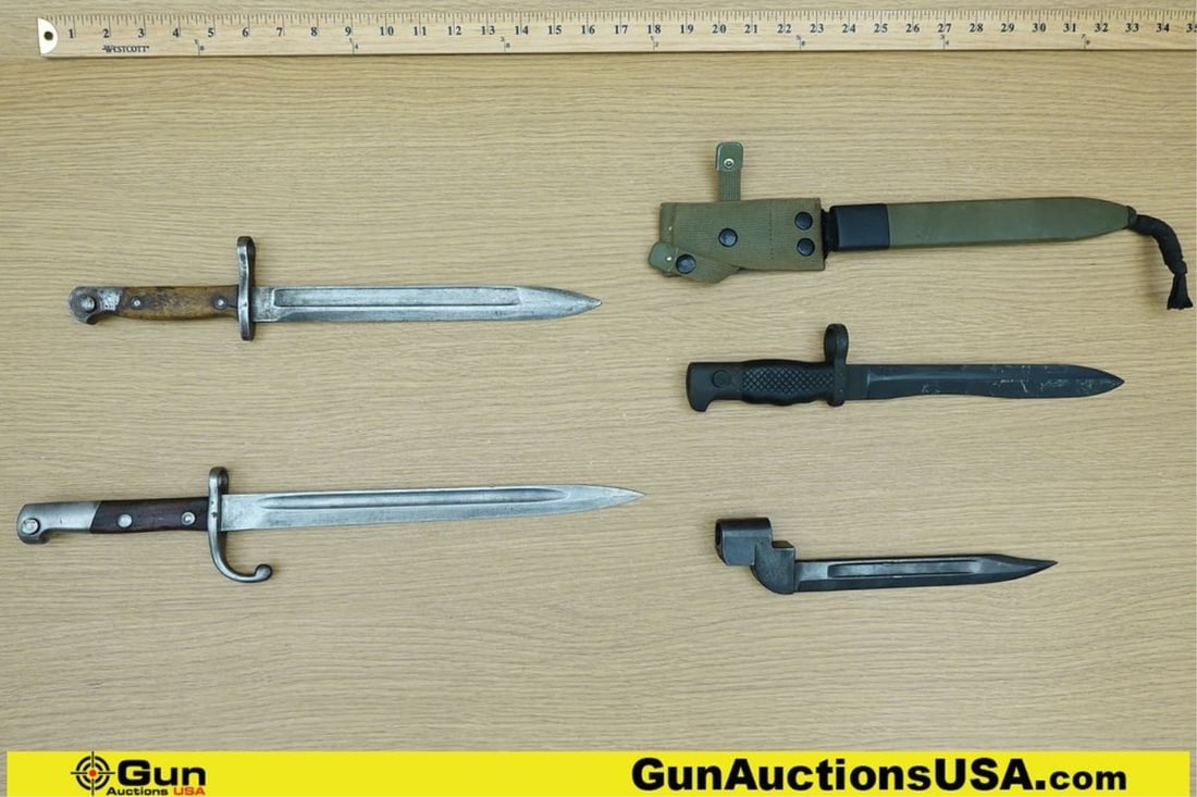 Military Surplus Bayonets. Good Condition. 4 Assorted Bayonets; 1 of the Bayonets Includes Sheath: Military Surplus Bayonets. Good Condition. 4 Assorted Bayonets; 1 of the Bayonets Includes Sheath and 3 Display Cartouche Markings on Blade Near Handgaurd... (72352) (GSCN29)
