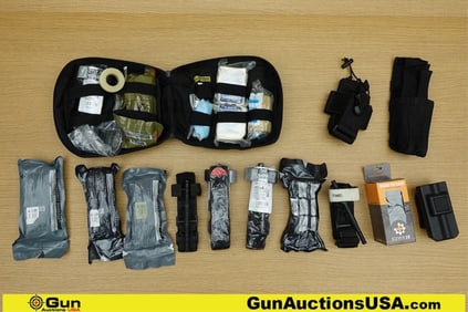 Eleven 10, Viper Ade, Protech, Etc. Trauma Kit, Etc. . Very Good. 1- Trauma Kit in Molly Cary Bag.