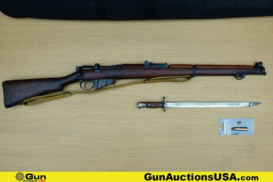 ENFIELD SMLE III 303 BRITISH Rifle. Very Good. 25" Barrel. Shiny Bore, Tight Action Bolt Action: ENFIELD SMLE III 303 BRITISH Rifle. Very Good. 25" Barrel. Shiny Bore, Tight Action Bolt Action Features a Blackened Barrel, Receiver and Bolt System, Adjustable Front and Rear Sights, Dark Walnut Ful