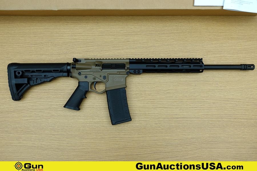 ATI OMNI HYBRID MAXX RIA P3P 5.56 NATO Rifle. NEW in Box. 18" Barrel. Semi Auto FDE Furniture, with: ATI OMNI HYBRID MAXX RIA P3P 5.56 NATO Rifle. NEW in Box. 18" Barrel. Semi Auto FDE Furniture, with Black Pistol Grip Stock and Forend Make this One Sharp Looking Rifle. 1:8 Twist Heavy Barrel, T Mark