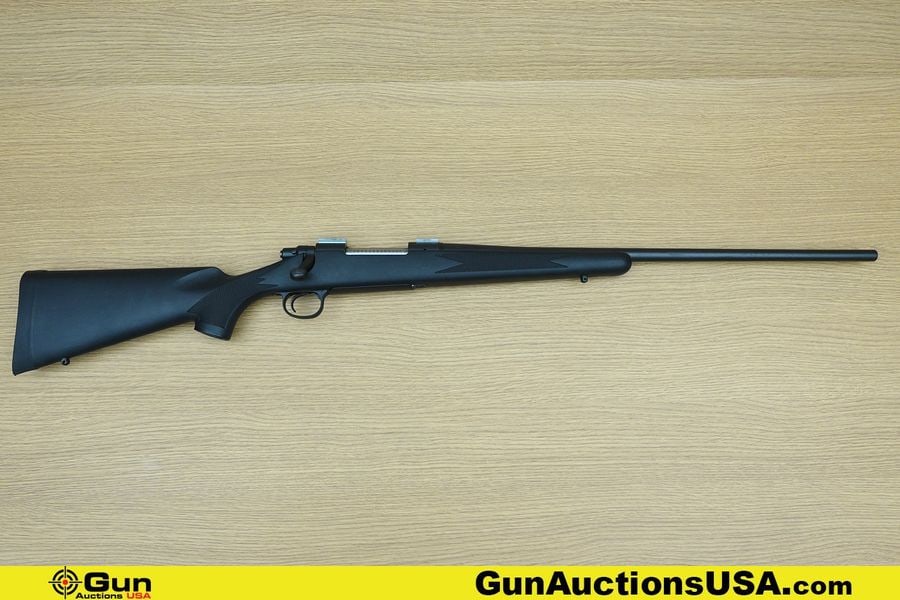 REMINGTON 700 7MM REM MAG Rifle. Good condition, Normal Handling Marks, Scattered Spotting and/or: REMINGTON 700 7MM REM MAG Rifle. Good condition, Normal Handling Marks, Scattered Spotting and/or Pitting. 24" Barrel. Shiny Bore, Tight Action Bolt Action Features a JEWELED BOLT, Checkered Bolt Hand