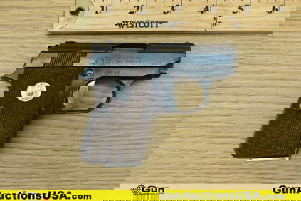 COLT JUNIOR .25 AUTO Pistol. Good condition, Normal Handling Marks, Scattered Spotting and/or