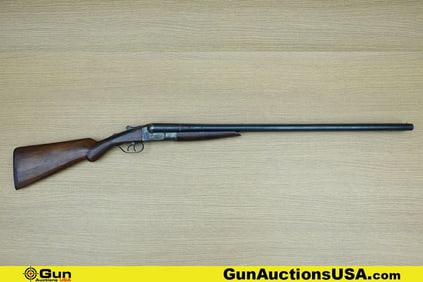 DAVIS AJAX 12 ga. Shotgun. Good condition, Normal Handling Marks, Scattered Spotting and/or Pitting.