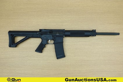 Bushmaster XM-15 E2S 5.56-.223 Rifle. Very Good. 16" Barrel. Shiny Bore, Tight Action Semi Auto