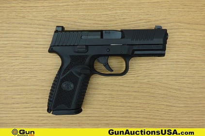 FN 509 9mm Pistol. Excellent. 4" Barrel. Shiny Bore, Tight Action Semi Auto Features Front and Rear