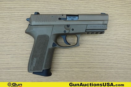 SIG SAUER SP2022 9MM Pistol. Very Good. 3.75" Barrel. Shiny Bore, Tight Action Semi Auto This