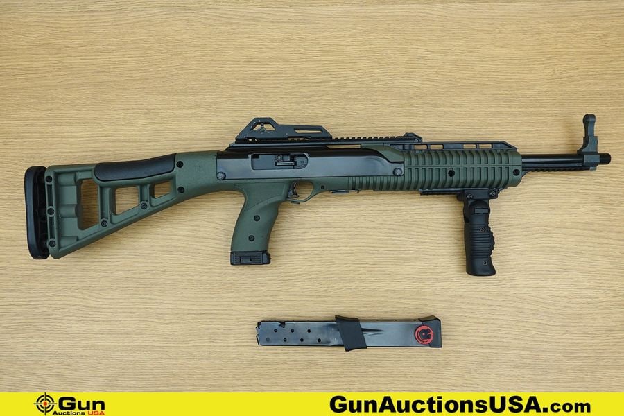 Hi-Point Firearms 4595 45 ACP Rifle. Excellent. 16" Barrel. Shiny Bore, Tight Action Semi Auto: Hi-Point Firearms 4595 45 ACP Rifle. Excellent. 16" Barrel. Shiny Bore, Tight Action Semi Auto Features a Blackened Barrel and Receiver, OD Green Polymer Hand Guard, Grip Frame, and Butt Stock. Hooded