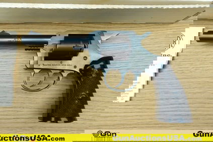 H&R INC 929 .22 LR Revolver. Very Good. 4" Barrel. Shiny Bore, Tight Action Features a Fixed Front