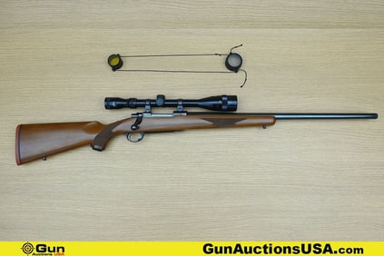 Ruger M77 243 WIN Rifle. Good condition, Normal Handling Marks, Scattered Spotting and/or Pitting.