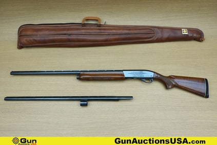 REMINGTON 1100 12 ga. Shotgun. Good condition, Normal Handling Marks, Scattered Spotting and/or
