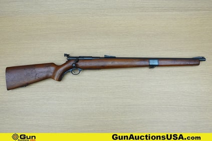 Mossberg 42 M-C .22 S-L-LR Rifle. Good condition, Normal Handling Marks, Scattered Spotting and/or