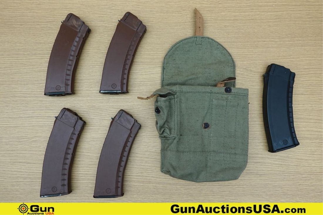 Circle 21, Circle 10 AK-74 5.45x39 Mags, Mag Pouch. Excellent. Four Brown Polymer Circle 21 30 Round: Circle 21, Circle 10 AK-74 5.45x39 Mags, Mag Pouch. Excellent. Four Brown Polymer Circle 21 30 Round Magazines, One Black Polymer 30 Round Magazine, and One Bulgarian OD Canvas Mag Pouch.. Bulgaria (7