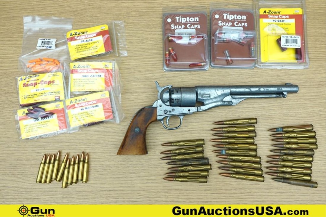 Tipton, A-Zoom, Etc. .40 S&W, .30-06 SPRNG, 9mm, Etc. Replica Pistol, Snap Caps, Etc.. Good: Tipton, A-Zoom, Etc. .40 S&W, .30-06 SPRNG, 9mm, Etc. Replica Pistol, Snap Caps, Etc.. Good Condition. One Replica Navy Style Revolver, Approx. 95 Assorted Caliber Snap Caps.. (75526) (GSCN64)