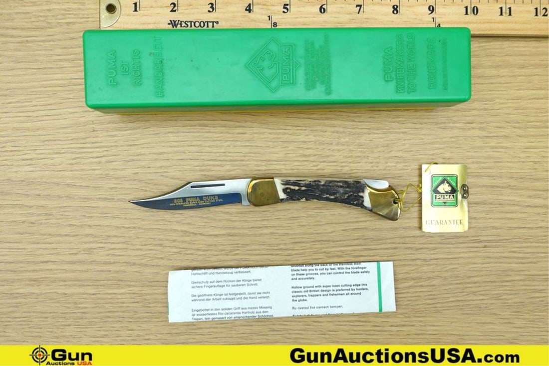 Puma 905 Duke Folding Knife. Excellent. Features a Stag and Brass Handle, Stainless Steel Blade: Puma 905 Duke Folding Knife. Excellent. Features a Stag and Brass Handle, Stainless Steel Blade Engraved with Factory Info on Left Side of Blade. Includes, Original Polymer Two-Tone Case.. Germany (75