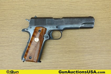 FED. ORD. INC. M1911A1 .45 ACP Pistol. Good condition, Normal Handling Marks, Scattered Spotting