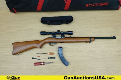 Ruger 10.22 .22LR Rifle. Good condition, Normal Handling Marks, Scattered Spotting and/or Pitting.