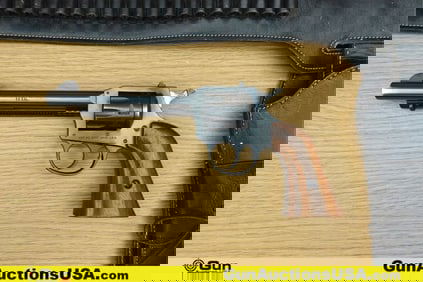 H&R INC 949 .22 CAL Revolver. Good condition, Normal Handling Marks, Scattered Spotting and/or