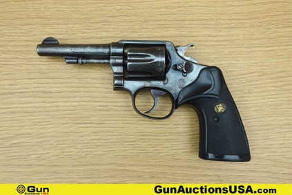S&W 1917 .38 S&W SPECIAL CTG Revolver. Good condition, Normal Handling Marks, Scattered Spotting