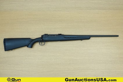 Savage AXIS .308 Rifle. Good condition, Normal Handling Marks, Scattered Spotting and/or Pitting.