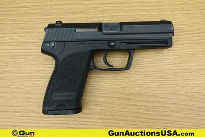 HK USP9 9mm Pistol. Very Good. 4.25" Barrel. Shiny Bore, Tight Action Semi Auto Features Adjustable
