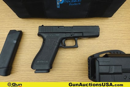 Glock 22 40 S&W Pistol. Good condition, Normal Handling Marks, Scattered Spotting and/or Pitting.