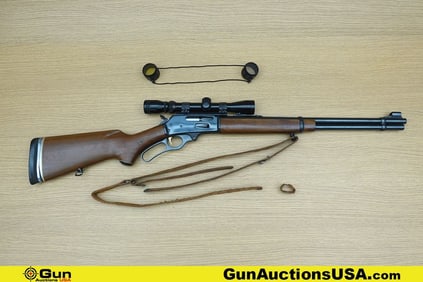 Marlin 336 .35 REM Rifle. Good condition, Normal Handling Marks, Scattered Spotting and/or Pitting.