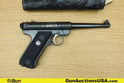 Ruger MK II .22 LR Pistol. Good condition, Normal Handling Marks, Scattered Spotting and/or Pitting.