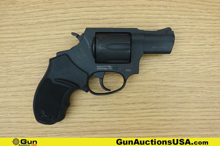 TAURUS 856 .38 SPECIAL Revolver. Very Good. 2" Barrel. Shiny Bore, Tight Action Features a Matte: TAURUS 856 .38 SPECIAL Revolver. Very Good. 2" Barrel. Shiny Bore, Tight Action Features a Matte Black Finish, Fixed Front Sight, Rear Gutter Sight, Textured Rubber Combat Grip, with a Smooth SA/DA Tr