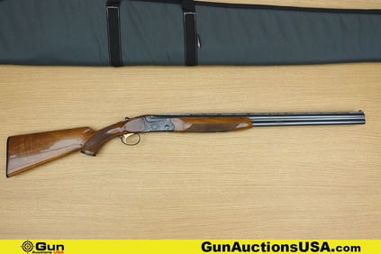SKB 500 20 ga. Shotgun. Good condition, Normal Handling Marks, Scattered Spotting and/or Pitting.