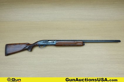 REMINGTON 1100 12 ga. Shotgun. Good condition, Normal Handling Marks, Scattered Spotting and/or