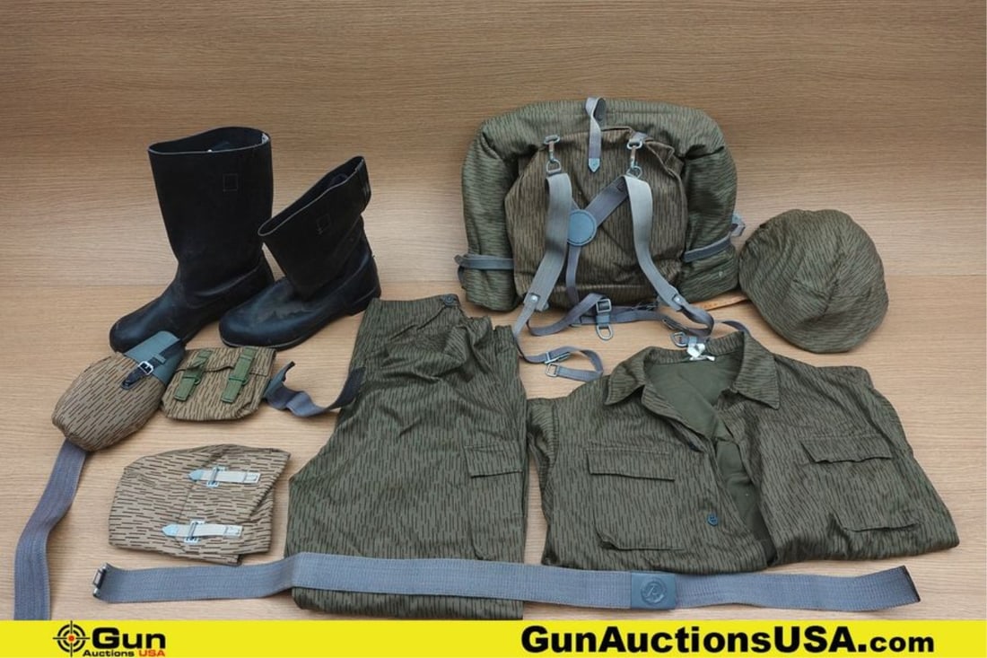 Military Surplus COLLECTOR'S Uniform, Boots, Etc. . Good Condition. EAST GERMAN COMBAT Uniform with: Military Surplus COLLECTOR'S Uniform, Boots, Etc. . Good Condition. EAST GERMAN COMBAT Uniform with Helmet, Camo Tunic, JACK BOOTS, Size 30.5 or U.S. 12.5. Two Waist Belts with Buckles. Y Straps, Cant