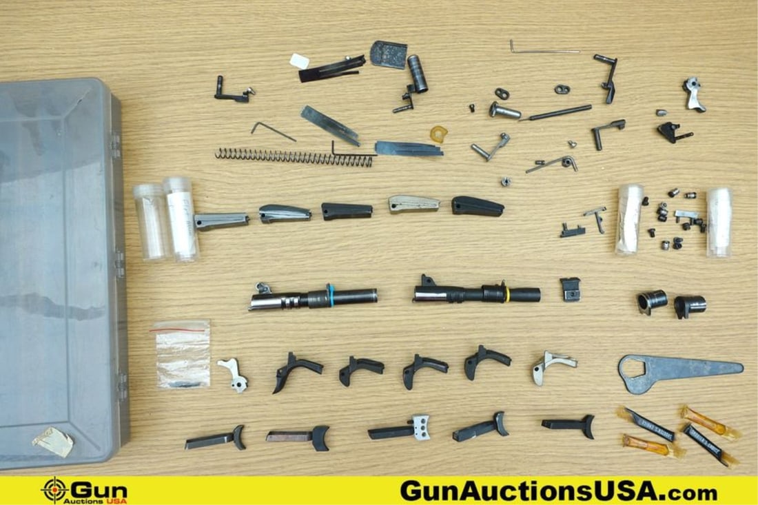 Colt, Springfield, Etc. 1911 .45 ACP, 9mm, Etc. Gun Parts. Good Condition. One Colt .45 AUTO 4.75 ": Colt, Springfield, Etc. 1911 .45 ACP, 9mm, Etc. Gun Parts. Good Condition. One Colt .45 AUTO 4.75 " Barrel, One Springfield 9mm 4.75" Barrel, Assorted Grip Safeties, 5 Assorted Triggers, and Other Ass