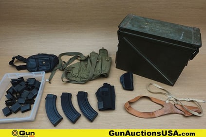 DeSantis, Etc. Enbloc Clips, Holsters, Etc. . Good Condition. Approx. 34 Enbloc Clips, Three-