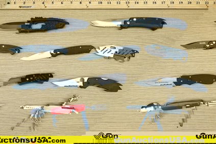 Gerber, Boker, Etc. Knives. Excellent. 3-Switchblades, and 7-Folding Knives.. (64368) (GSCM68)