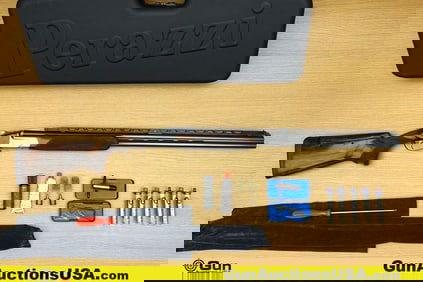 PERAZZI MX2000 12 ga. Shotgun. Good condition, Normal Handling Marks, Scattered Spotting and/or