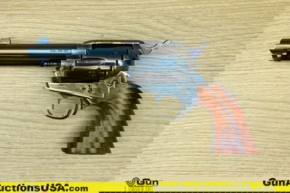 Uberti 38-40 WIN Revolver. Good condition, Normal Handling Marks, Scattered Spotting and/or Pitting.