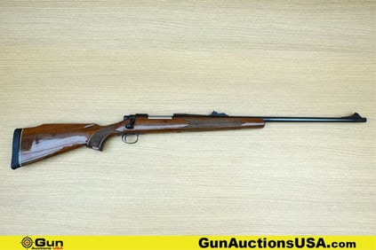 REMINGTON 700 7MM REM MAG JEWELED BOLT Rifle. Very Good. 24" Barrel. Shiny Bore with Slight Pitting,