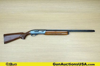REMINGTON 1100 12 ga. Shotgun. Good condition, Normal Handling Marks, Scattered Spotting and/or