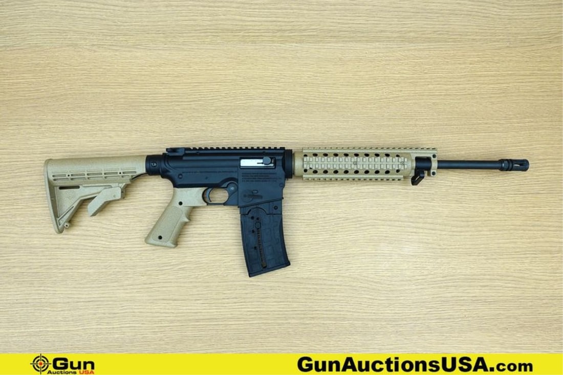 Mossberg 715T .22 LR TACTICAL Rifle. Very Good. 17.5" Barrel. Shiny Bore, Tight Action Semi Auto: Mossberg 715T .22 LR TACTICAL Rifle. Very Good. 17.5" Barrel. Shiny Bore, Tight Action Semi Auto Features a Polymer Receiver with Metal Internals, Matte Blued Barrel with A2 Flashider, FDE Polymer Fro