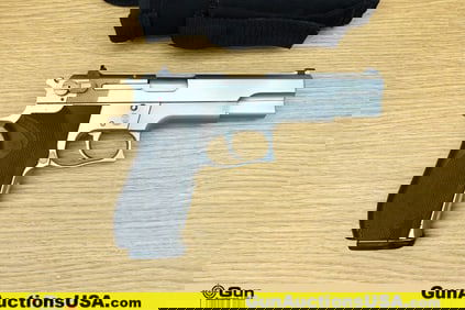S&W 645 45 ACP Pistol. Good condition, Normal Handling Marks, Scattered Spotting and/or Pitting. 5"