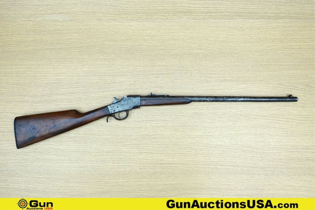 HOPKINS & ALLEN ARMS CO. JUNIOR 922 .22 LR Rifle. Fair Condition. 22.5" Barrel. Shootable Bore,: HOPKINS & ALLEN ARMS CO. JUNIOR 922 .22 LR Rifle. Fair Condition. 22.5" Barrel. Shootable Bore, Tight Action Single Action Falling Block Manufactured between 1902-1914. Case Colored Receiver, Under Ba