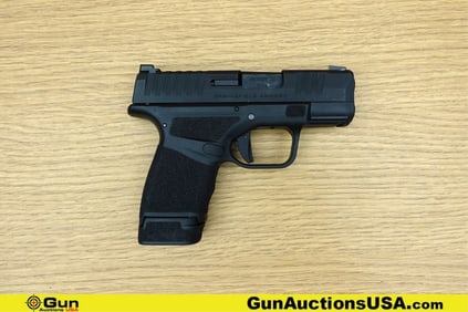 SPRINGFIELD Hellcat 9mm Pistol. Good condition, Normal Handling Marks, Scattered Spotting and/or