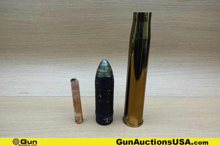 Military Surplus COLLECTOR'S Shell, Casing, Etc. . Good Condition. One INERT WWI British Artillery: Military Surplus COLLECTOR'S Shell, Casing, Etc. . Good Condition. One INERT WWI British Artillery Shell. One 1943 57 MM Brass Shell Casing and a 1938 Dated Japanese Type 100, High Explosive Anti- Air