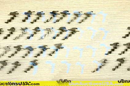 1911 Gun Parts. Good Condition. Twenty-Six Assorted 1911 Backstrap Safeties.. (76636) (GSCM20)